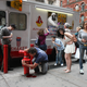 Stricken with vomiting, diarrhea, and inflamed larynxes, Ebola victims hemmorhage violently and wait to claim their free cones.